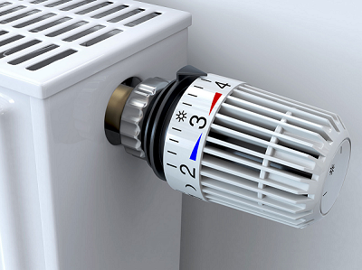 Auf dem Bild ist ein Thermostat an einer Heizung dargestellt, auf dem die Ziffern zu erkennen sind, welche sich einstellen lassen.